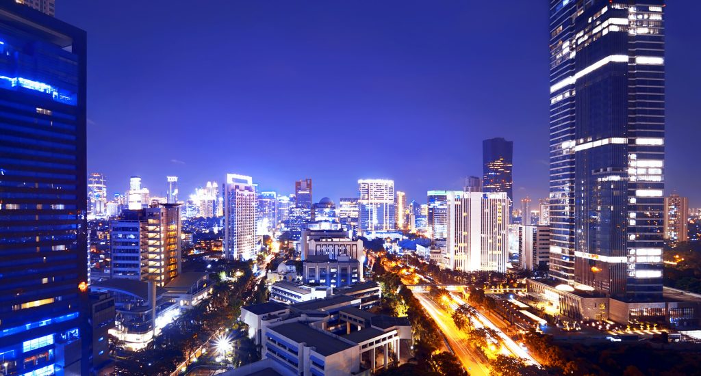 Jakarta city at night with modern building